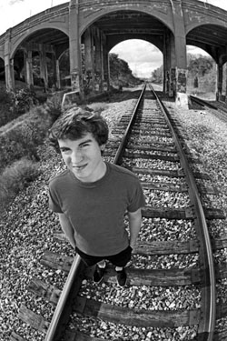 alex nault modeling portrait at tro bridge in bloomfield hills michgian in black and white